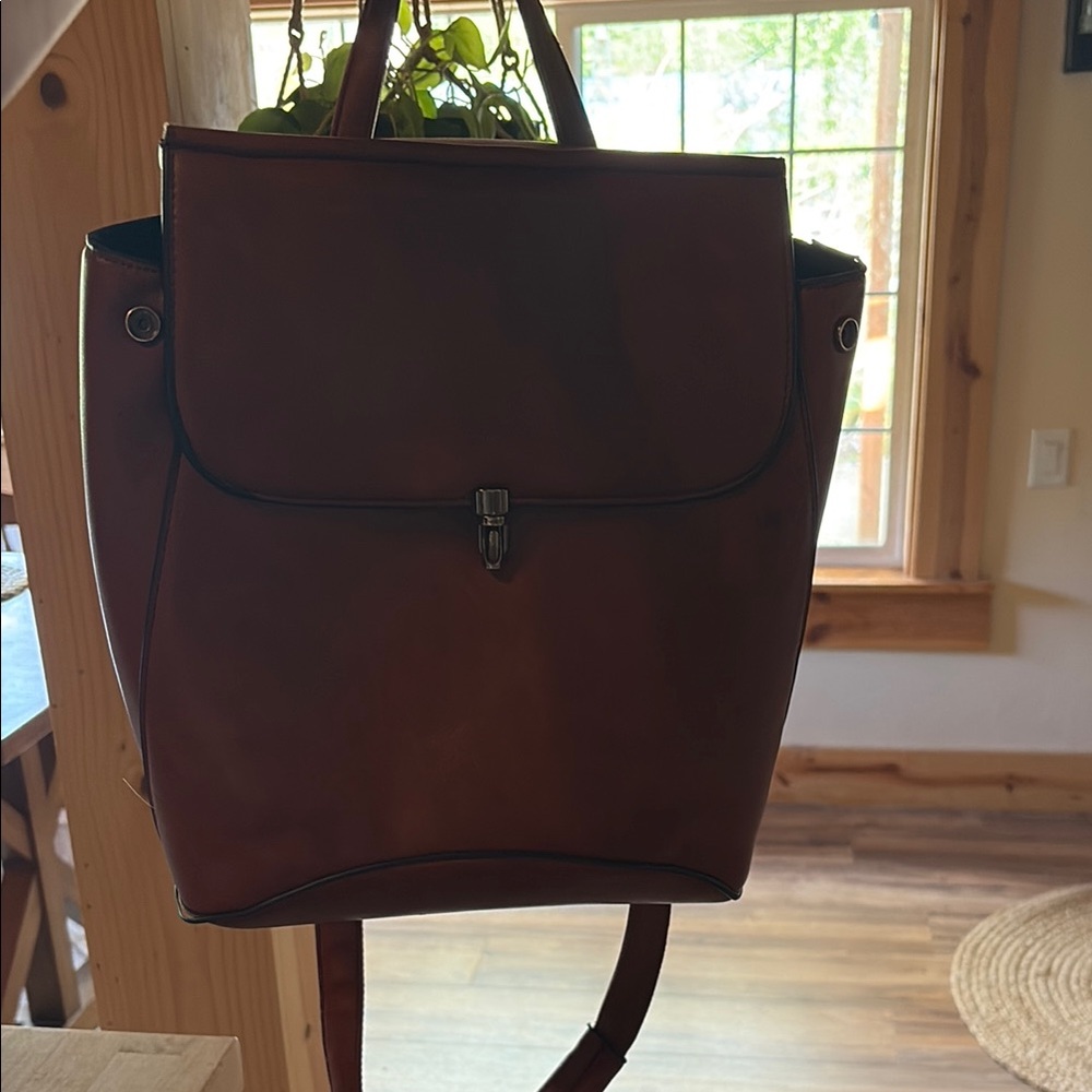 Brown Leather Backpack With Flap Closure - image 1